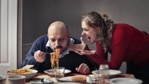husband eating pasta