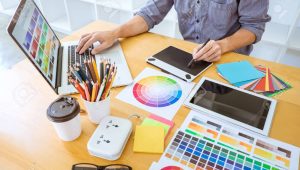 Young creative graphic designer working on project architectural