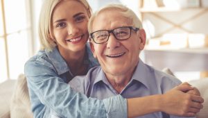 handsome-old-man-beautiful-young-girl-are-hugging_85574-5707