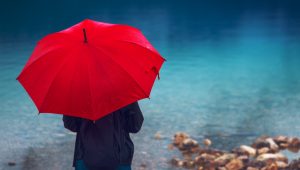 Woman with red umbrella