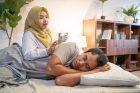 wife-waking-her-husband-up-bed-to-have-breakfast-muslim-wife-waking-her-husband-up-bed-to-have-breakfast-241084910