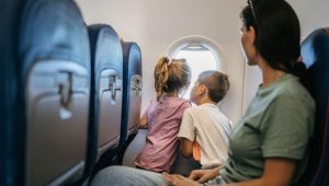 window seat - plane - children - passengers